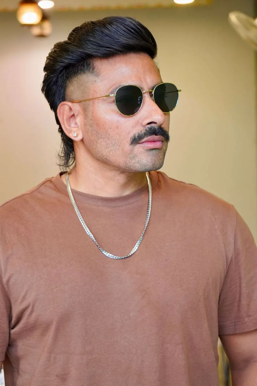 2. Mullet with a mid fade