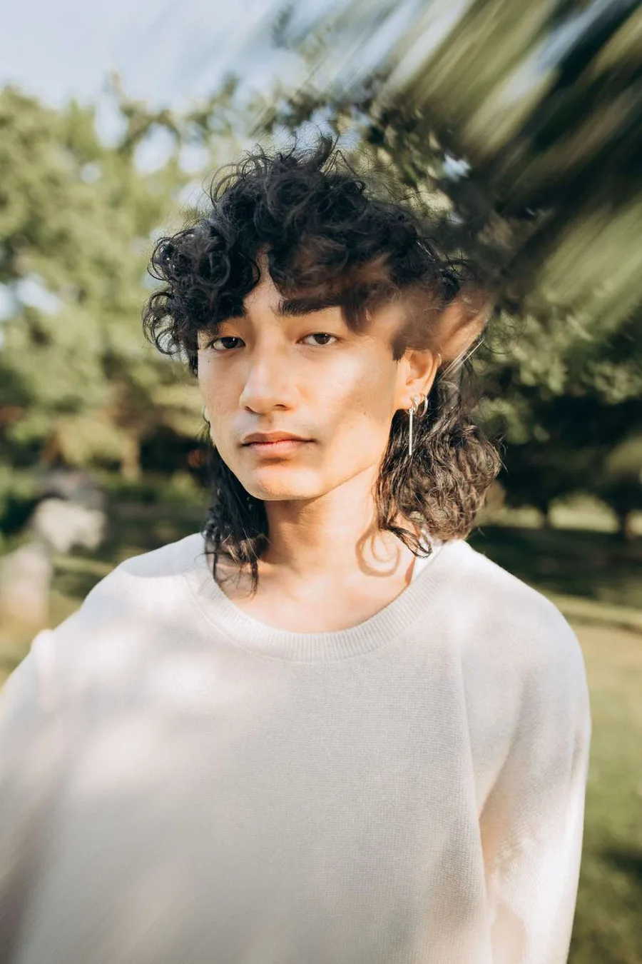 6. The long curly mullet